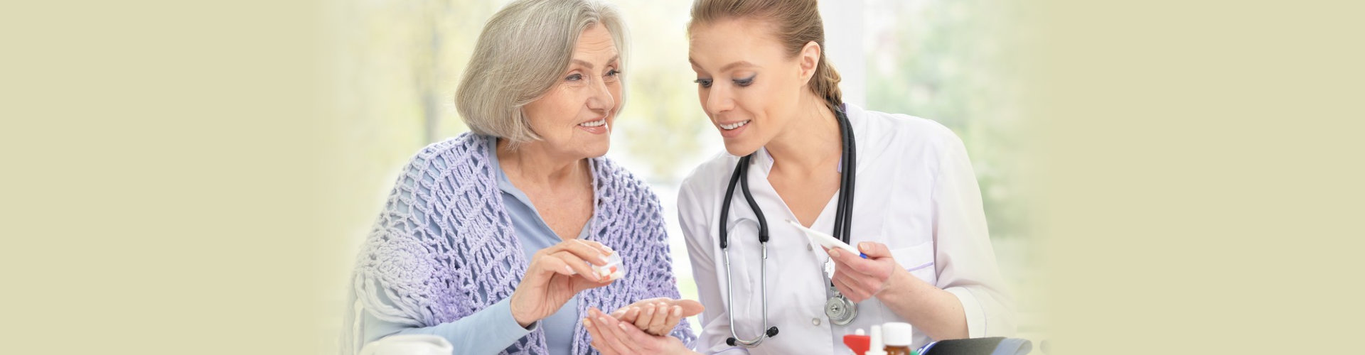 young doctor and her senior senior patient